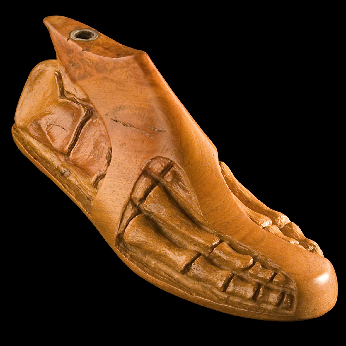 Escultura 'Huesorma' tallada en madera de quebracho